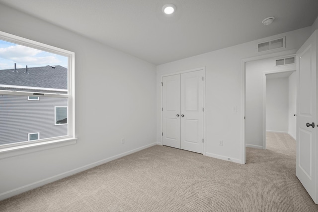 1520 Philipp Way, Shakopee, MN 55379 - unfurnished bedroom featuring carpet flooring, baseboards, and a closet