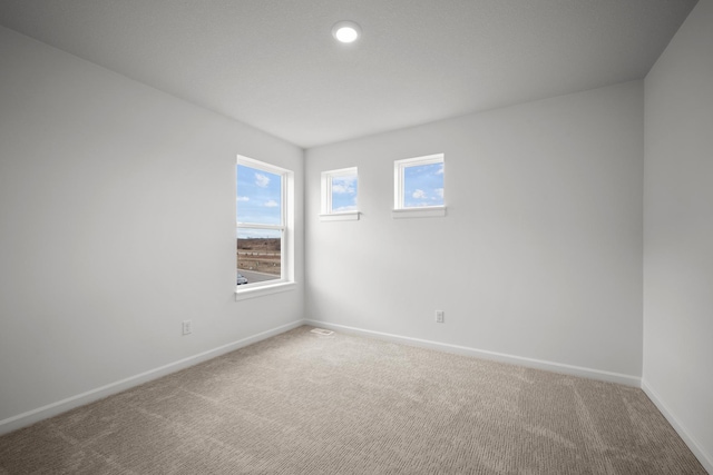 1520 Philipp Way, Shakopee, MN 55379 - spare room featuring baseboards and carpet floors