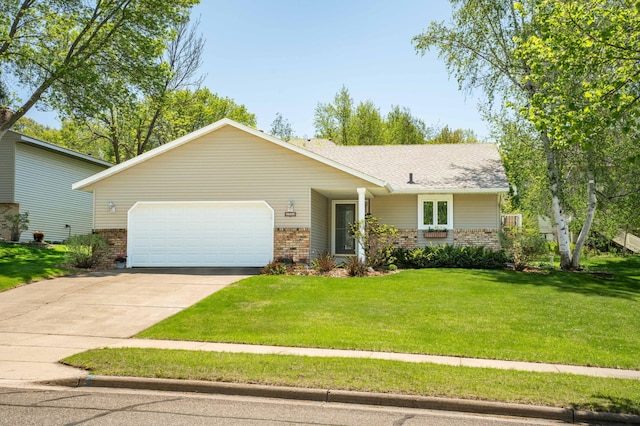 1944 Linda Ln, Saint Cloud, MN 56301 - view of front of property featuring brick siding, an attached garage, driveway, and a front yard