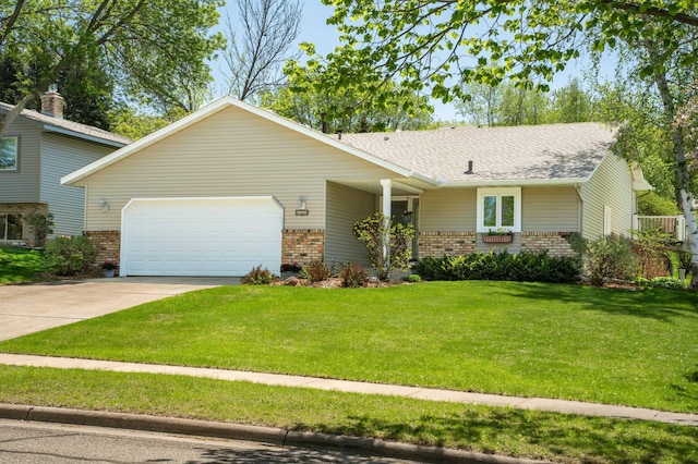 1944 Linda Ln, Saint Cloud, MN 56301 - view of front of property with brick siding, a garage, driveway, and a front lawn