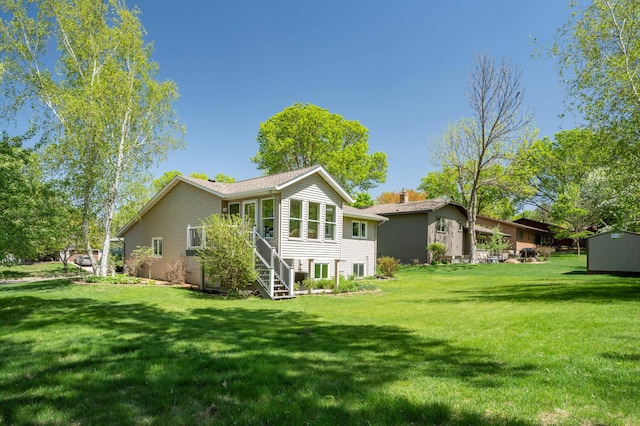 1944 Linda Ln, Saint Cloud, MN 56301 - rear view of property featuring a yard and stairway