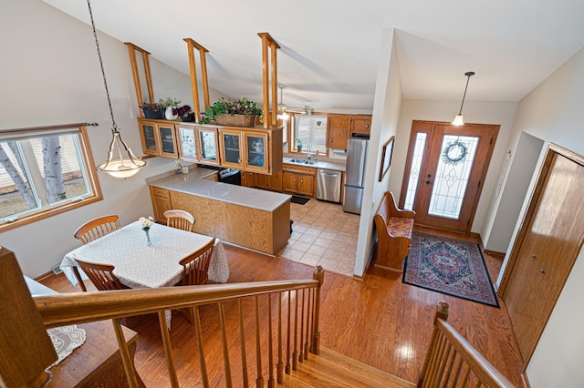 1944 Linda Ln, Saint Cloud, MN 56301 - entrance foyer featuring lofted ceiling, baseboards, and light wood-style floors