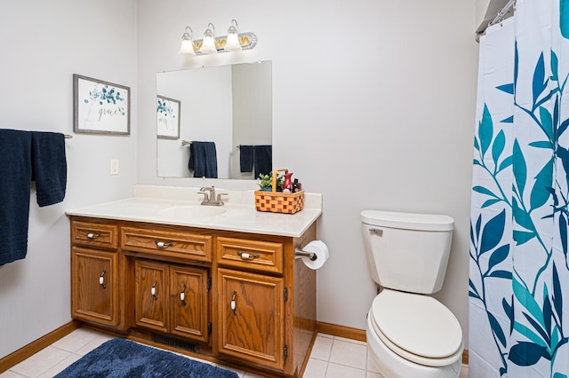 1944 Linda Ln, Saint Cloud, MN 56301 - full bathroom featuring tile patterned flooring, toilet, baseboards, and vanity