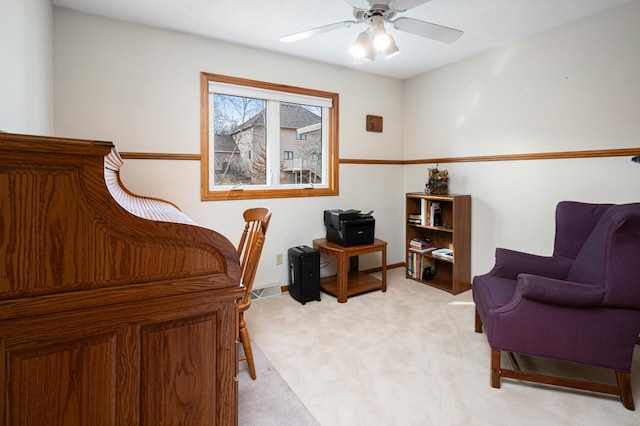 1944 Linda Ln, Saint Cloud, MN 56301 - home office with light colored carpet, a ceiling fan, and baseboards