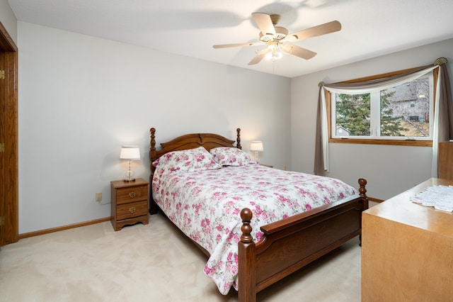 1944 Linda Ln, Saint Cloud, MN 56301 - bedroom featuring light colored carpet, a ceiling fan, and baseboards