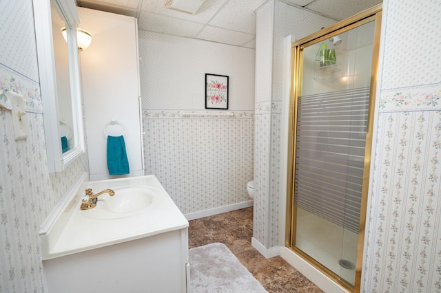 1944 Linda Ln, Saint Cloud, MN 56301 - bathroom featuring a shower stall, vanity, wallpapered walls, tile patterned flooring, and toilet