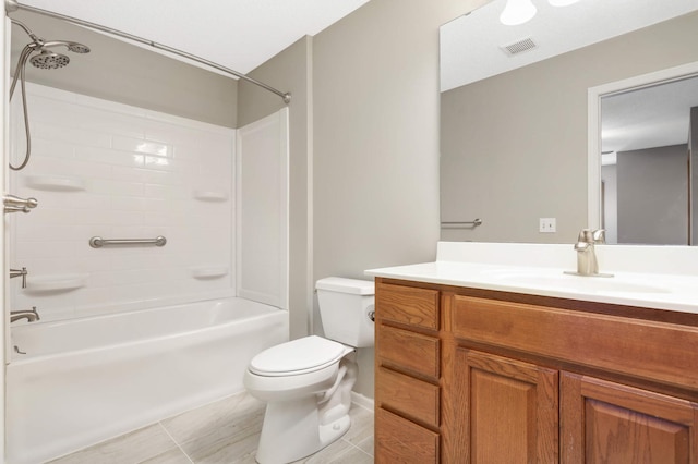 bathroom featuring visible vents, toilet, shower / bathing tub combination, tile patterned floors, and vanity