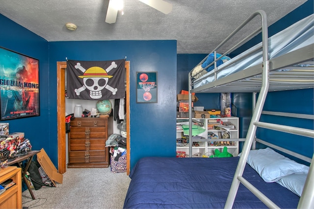 2071 Erickson Ln, Mora, MN 55051 - carpeted bedroom with a textured ceiling and ceiling fan