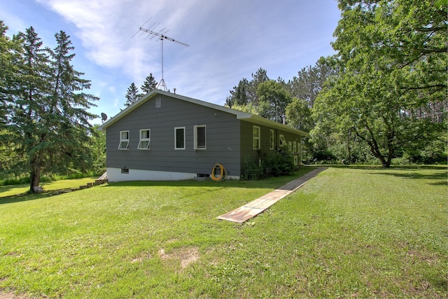 2071 Erickson Ln, Mora, MN 55051 - view of home's exterior featuring a lawn