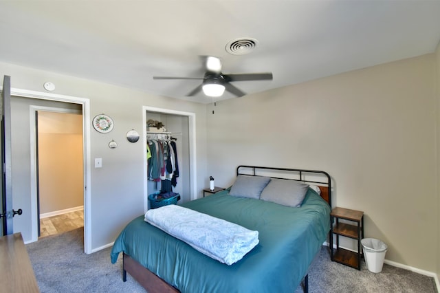 2604 Clearwater Rd, Saint Cloud, MN 56301 - carpeted bedroom with a closet, baseboards, and a ceiling fan