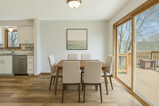 dining room with light wood-type flooring