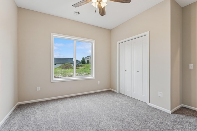 4905 Evergreen Dr N, Hugo, MN 55038 - unfurnished bedroom with carpet, a closet, and ceiling fan