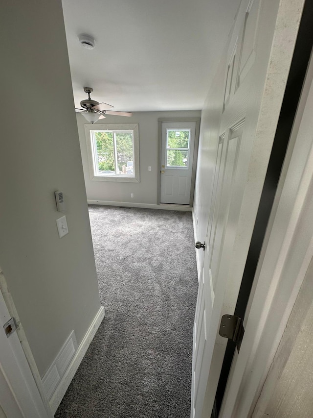 412 Holly Ln, Mankato, MN 56001 - hallway featuring baseboards and carpet floors