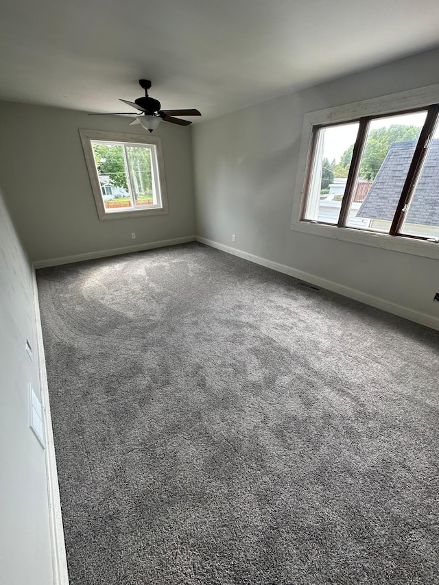 412 Holly Ln, Mankato, MN 56001 - carpeted spare room featuring ceiling fan and baseboards