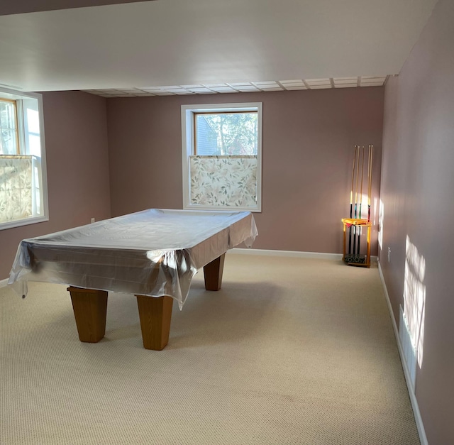 rec room featuring a wealth of natural light, carpet flooring, and baseboards