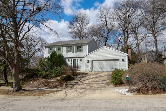 view of front of home with an attached garage and concrete driveway