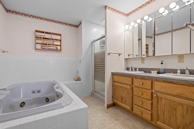 N2641 Cipra Rd, Sarona, WI 54870 - bathroom with a stall shower, a whirlpool tub, double vanity, and tile patterned flooring
