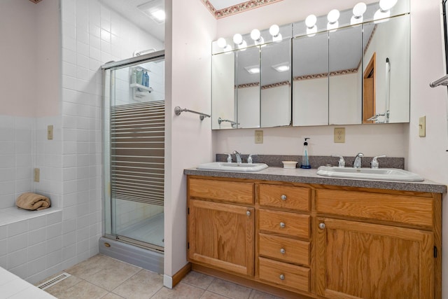 N2641 Cipra Rd, Sarona, WI 54870 - full bathroom with a shower stall, tile patterned floors, and double vanity