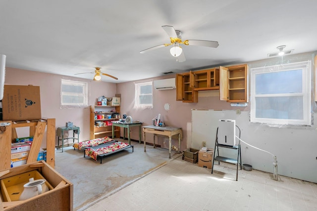 N2641 Cipra Rd, Sarona, WI 54870 - playroom with a wall unit AC and a ceiling fan