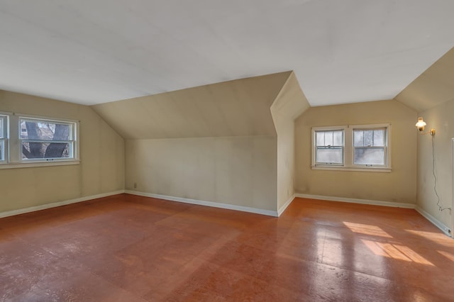 301 7th Ave S, Saint Cloud, MN 56301 - additional living space with lofted ceiling and baseboards