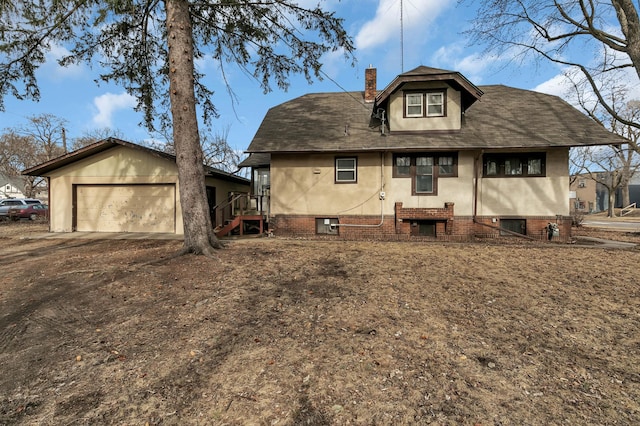 301 7th Ave S, Saint Cloud, MN 56301 - back of property with a chimney, dirt driveway, stucco siding, and roof with shingles