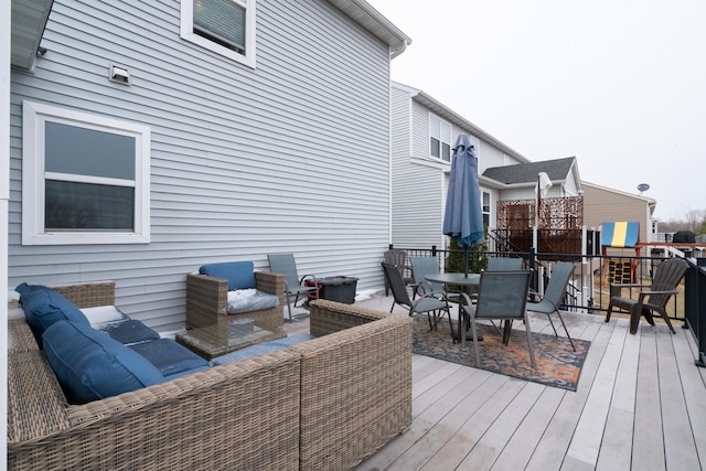 460 14th St NW, New Brighton, MN 55112 - deck with an outdoor hangout area and outdoor dining area