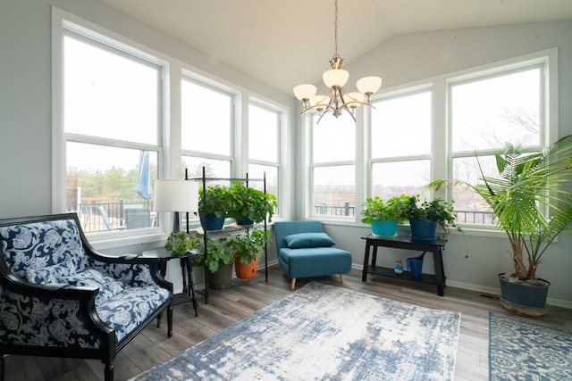 460 14th St NW, New Brighton, MN 55112 - sunroom / solarium with plenty of natural light, a chandelier, and vaulted ceiling