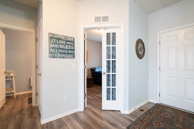 460 14th St NW, New Brighton, MN 55112 - foyer with wood finished floors and baseboards