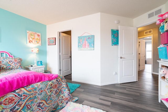 460 14th St NW, New Brighton, MN 55112 - bedroom with wood finished floors and baseboards