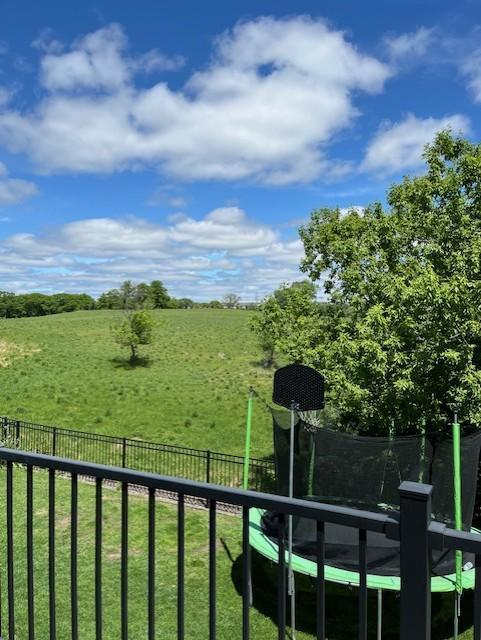 460 14th St NW, New Brighton, MN 55112 - view of yard featuring a trampoline