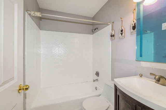 bathroom featuring shower / bathtub combination, toilet, and vanity
