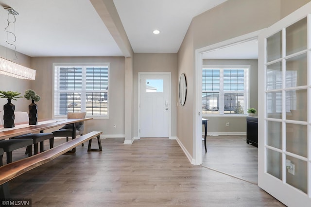 7122 156th St, Savage, MN 55378 - entryway featuring baseboards, wood finished floors, and recessed lighting