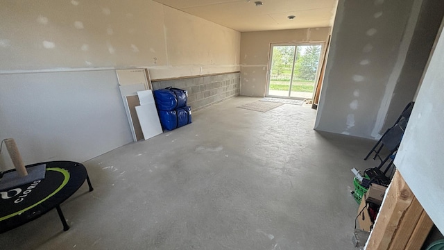 230 Newspaper Run NE, Kimball, MN 55353 - unfurnished living room with concrete flooring
