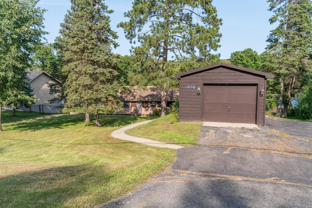 332 Riverside Ave S, Sartell, MN 56377 - detached garage featuring asphalt driveway