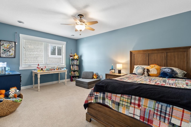 5459 Bartlett Blvd, Mound, MN 55364 - bedroom with light carpet, baseboards, and a ceiling fan