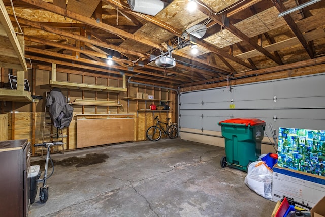 garage featuring a garage door opener