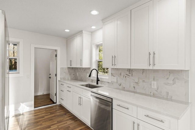 2308 Shadywood Rd, Orono, MN 55391 - kitchen with dishwasher, a sink, white cabinets, backsplash, and recessed lighting