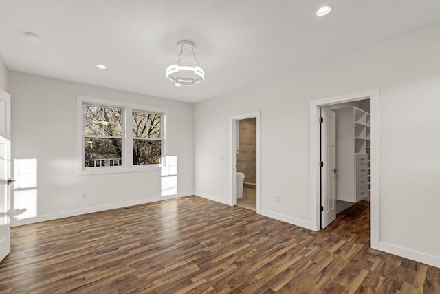 2308 Shadywood Rd, Orono, MN 55391 - unfurnished dining area featuring dark wood-type flooring, baseboards, and recessed lighting