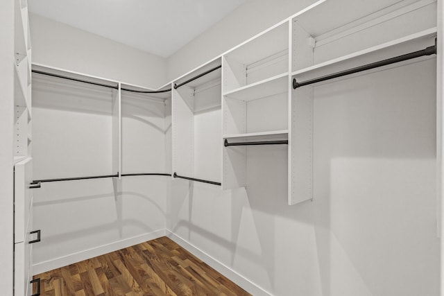 2308 Shadywood Rd, Orono, MN 55391 - walk in closet featuring dark wood-style floors