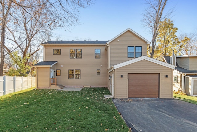 2308 Shadywood Rd, Orono, MN 55391 - back of house featuring driveway and an attached garage