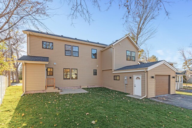 2308 Shadywood Rd, Orono, MN 55391 - back of property with a garage and driveway
