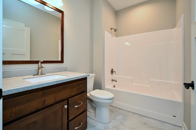 full bath with toilet, marble finish floor, shower / washtub combination, and vanity