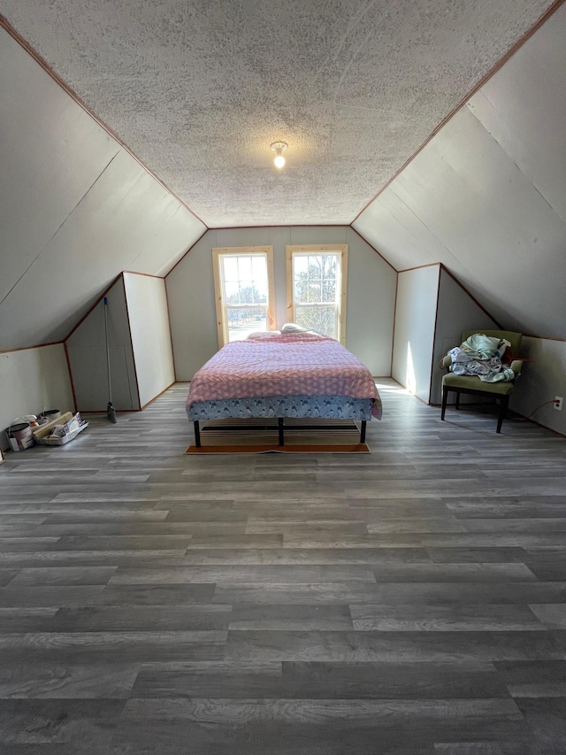 320 8th St SE, Staples, MN 56479 - bedroom featuring vaulted ceiling and wood finished floors