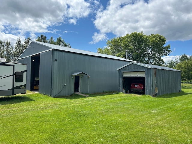 43475 310th Ave NE, Gatzke, MN 56724 - view of pole building featuring a lawn and driveway
