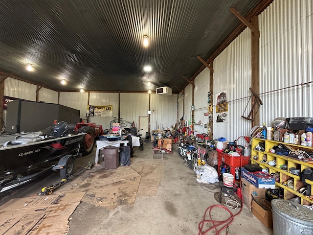 43475 310th Ave NE, Gatzke, MN 56724 - garage featuring a workshop area and metal wall
