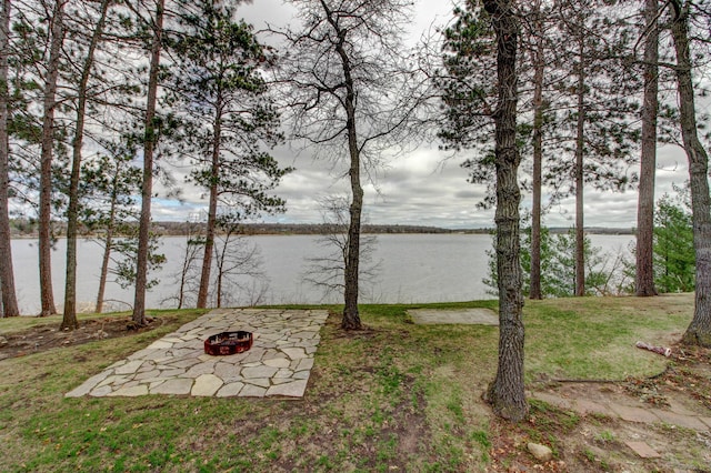 water view featuring an outdoor fire pit