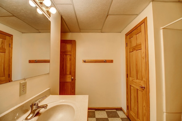 bathroom with vanity and tile patterned floors
