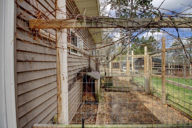 view of side of home with exterior structure