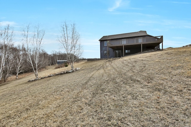 view of yard featuring a wooden deck