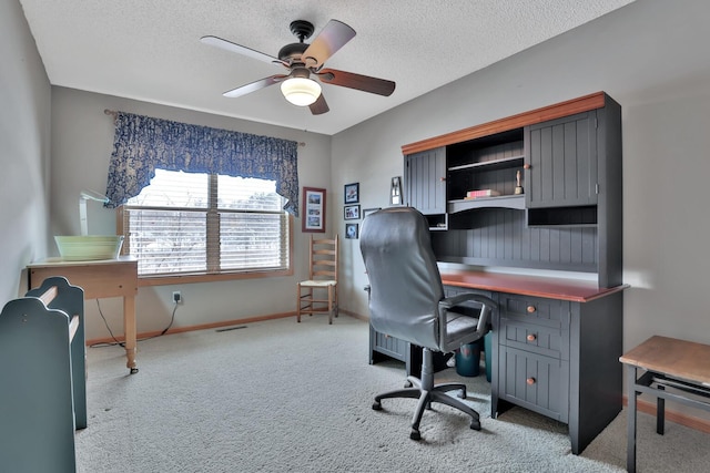 29561 Mentzer Ct, Lindstrom, MN 55045 - home office featuring ceiling fan, carpet flooring, baseboards, and a textured ceiling